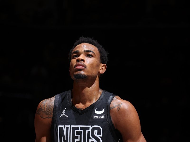 BROOKLYN, NY - JANUARY 15: Nicolas Claxton #33 of the Brooklyn Nets prepares to shoot a free throw during the game against the Miami Heat on January 15, 2024 at Barclays Center in Brooklyn, New York. NOTE TO USER: User expressly acknowledges and agrees that, by downloading and or using this Photograph, user is consenting to the terms and conditions of the Getty Images License Agreement. Mandatory Copyright Notice: Copyright 2024 NBAE (Photo by Nathaniel S. Butler/NBAE via Getty Images)