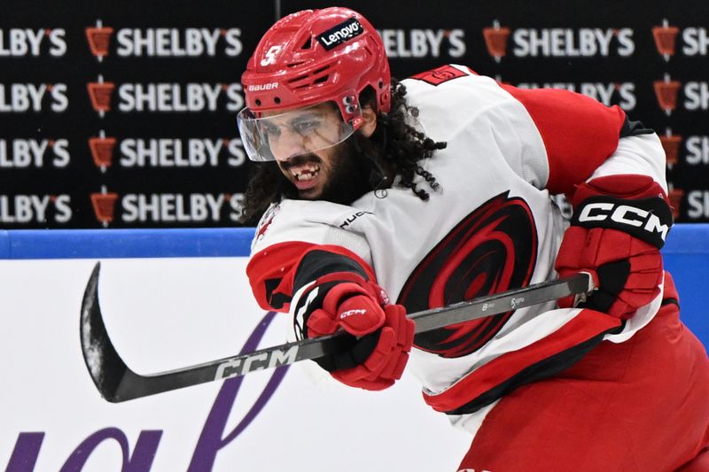 Mar 20, 2026; Toronto, Ontario, CAN;  Carolina Hurricanes defenseman Jalen Chatfield (5) warms up before playing the Toronto Maple Leafs at Scotiabank Arena. Mandatory Credit: Dan Hamilton-Imagn Images