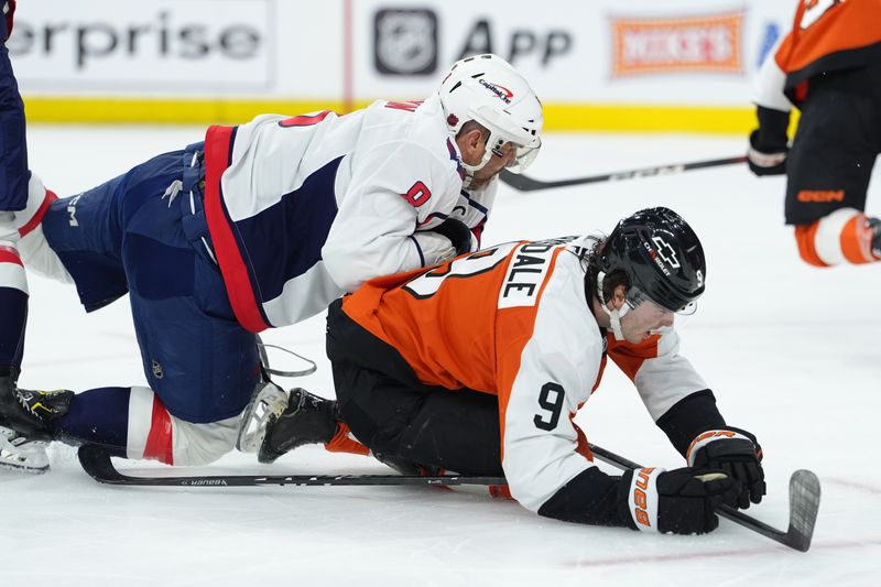 Mar 11, 2026; Philadelphia, Pennsylvania, USA; Washington Capitals left wing Alex Ovechkin (8) hits Philadelphia Flyers defenseman Jamie Drysdale (9) in the second period at Xfinity Mobile Arena. Mandatory Credit: Kyle Ross-Imagn Images