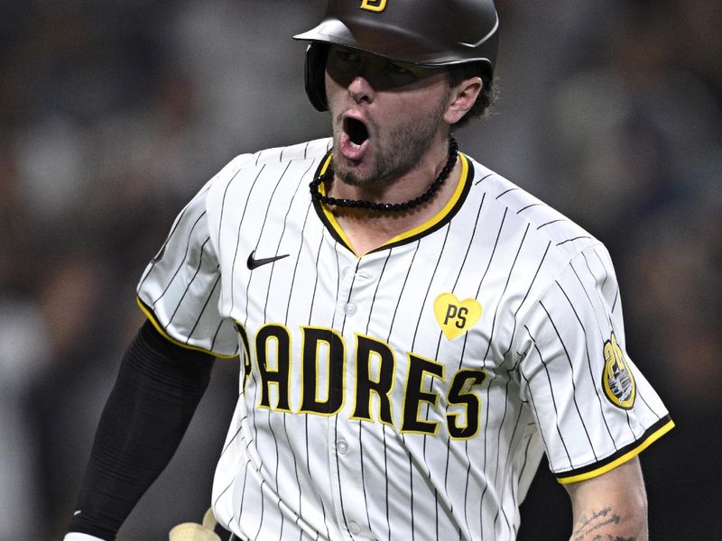 May 13, 2024; San Diego, California, USA; San Diego Padres center fielder Jackson Merrill (3) celebrates after hitting a home run during the seventh inning against the Colorado Rockies at Petco Park. Mandatory Credit: Orlando Ramirez-USA TODAY Sports