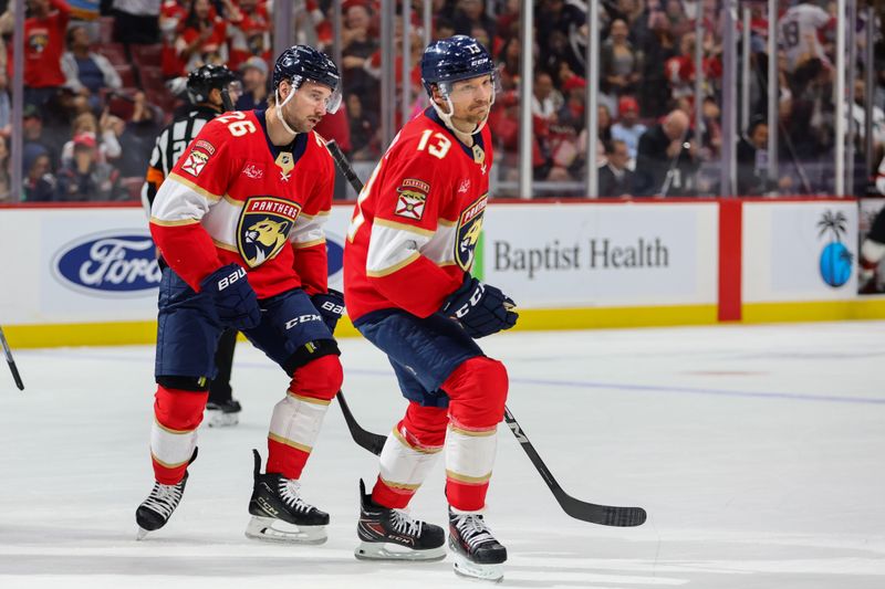 Nov 12, 2024; Sunrise, Florida, USA; Florida Panthers center Sam Reinhart (13) looks on after scoring against the New Jersey Devils during the second period at Amerant Bank Arena. Mandatory Credit: Sam Navarro-Imagn Images