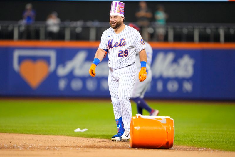 Aug 30, 2023; New York City, New York, USA;  New York Mets right fielder DJ Steward (29) after being doused by gatorade after the game against the Texas Rangers at Citi Field. Mandatory Credit: Gregory Fisher-USA TODAY Sports