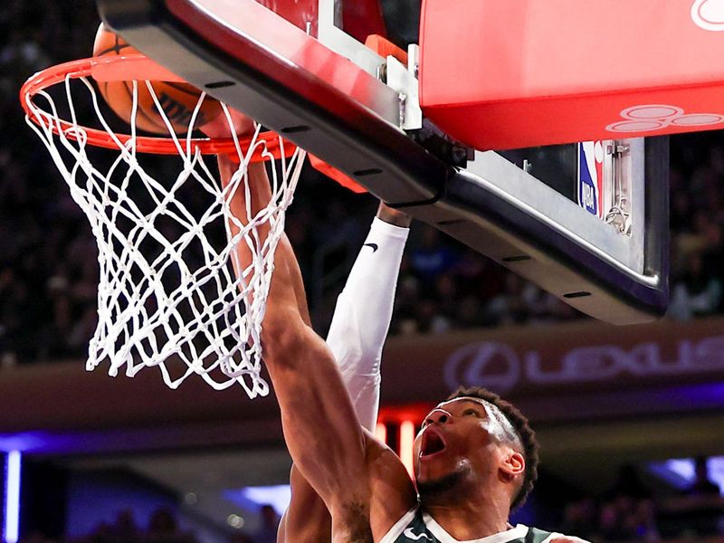 NEW YORK, NEW YORK - DECEMBER 25:  Giannis Antetokounmpo #34 of the Milwaukee Bucks dunks during the third quarter against the New York Knicks at Madison Square Garden on December 25, 2023 in New York City.  NOTE TO USER: User expressly acknowledges and agrees that, by downloading and or using this photograph, User is consenting to the terms and conditions of the Getty Images License Agreement. (Photo by Rich Graessle/Getty Images)