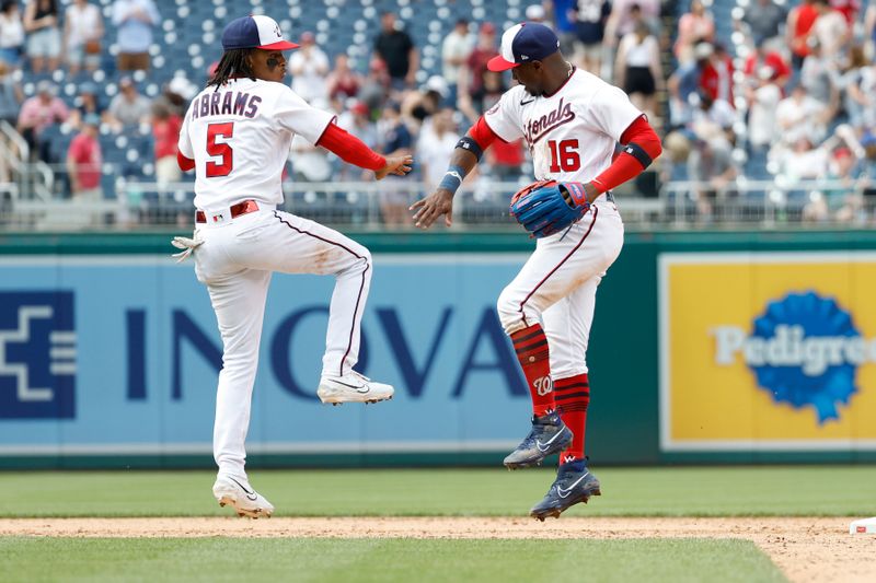 Apr 16, 2023; Washington, District of Columbia, USA; Washington Nationals shortstop CJ Abrams (5) celebrates with Nationals center fielder Victor Robles (16) after their game against the Cleveland Guardians at Nationals Park. Mandatory Credit: Geoff Burke-USA TODAY Sports