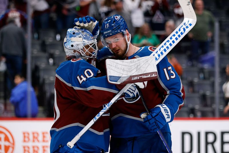 Oct 5, 2022; Denver, Colorado, USA; Colorado Avalanche right wing Valeri Nichushkin (13) reacts with goaltender Alexandar Georgiev (40) after the game against the Dallas Stars at Ball Arena. Mandatory Credit: Isaiah J. Downing-USA TODAY Sports