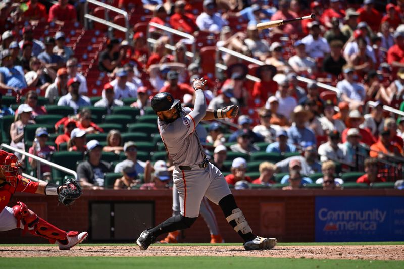 Jun 23, 2024; St. Louis, Missouri, USA; San Francisco Giants center fielder Heliot Ramos (17) loses control of his bat during an at bat against the St. Louis Cardinals in the eighth inning at Busch Stadium. Mandatory Credit: Joe Puetz-USA TODAY Sports