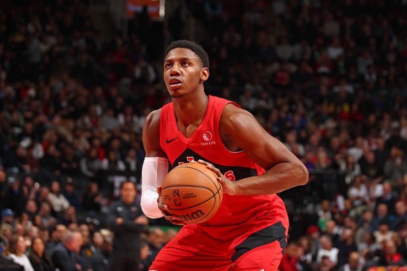 TORONTO, CANADA - JANUARY 17: RJ Barrett #9 of the Toronto Raptors shoots a free throw during the game against the Miami Heat on January 17, 2024 at the Scotiabank Arena in Toronto, Ontario, Canada.  NOTE TO USER: User expressly acknowledges and agrees that, by downloading and or using this Photograph, user is consenting to the terms and conditions of the Getty Images License Agreement.  Mandatory Copyright Notice: Copyright 2024 NBAE (Photo by Vaughn Ridley/NBAE via Getty Images)