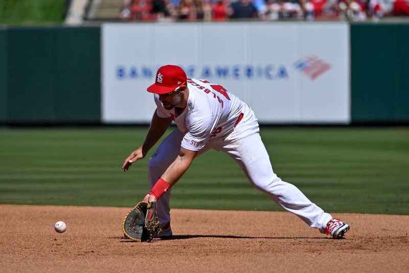 Apr 6, 2024; St. Louis, Missouri, USA;  St. Louis Cardinals first baseman Paul Goldschmidt (46) fields a ground ball against the Miami Marlins during the sixth inning at Busch Stadium. Mandatory Credit: Jeff Curry-USA TODAY Sports