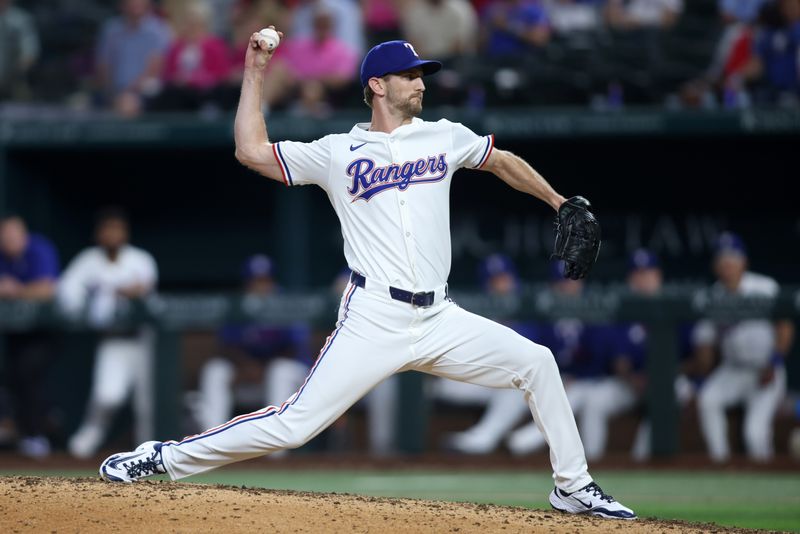 May 14, 2025; Arlington, Texas, USA; Texas Rangers pitcher Caleb Boushley (70) throws a pitch during the seventh inning against the Colorado Rockies at Globe Life Field. Mandatory Credit: Tim Heitman-Imagn Images