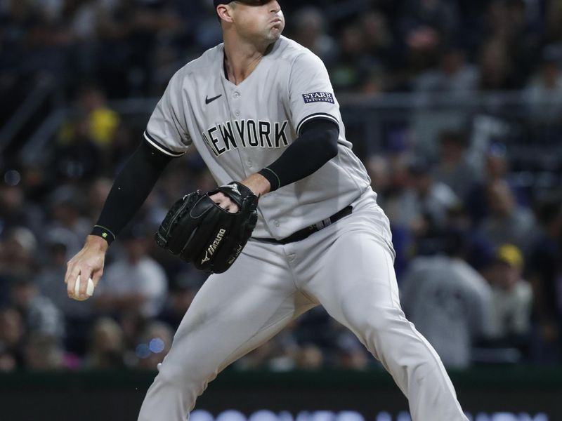 Sep 16, 2023; Pittsburgh, Pennsylvania, USA; New York Yankees relief pitcher Clay Holmes (35) pitches against the Pittsburgh Pirates during the ninth inning at PNC Park. New York won 6-3. Mandatory Credit: Charles LeClaire-USA TODAY Sports