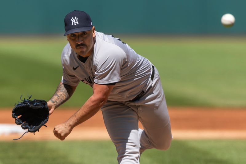 Apr 14, 2024; Cleveland, Ohio, USA; New York Yankees starting pitcher Nestor Cortes (65) throws the ball to the Cleveland Guardians during the first inning at Progressive Field. Mandatory Credit: Scott Galvin-USA TODAY Sports