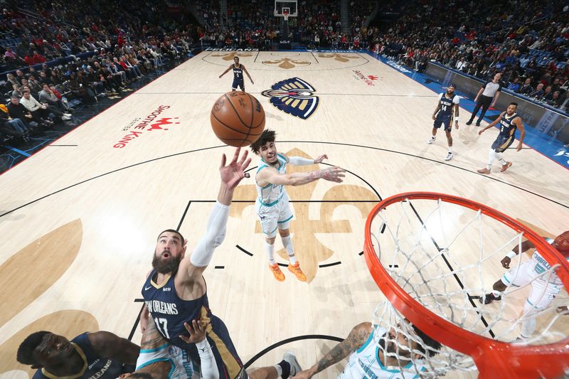 NEW ORLEANS, LA - JANUARY 17: Jonas Valanciunas #17 of the New Orleans Pelicans shoots the ball during the game against the Charlotte Hornets on January 17, 2024 at the Smoothie King Center in New Orleans, Louisiana. NOTE TO USER: User expressly acknowledges and agrees that, by downloading and or using this Photograph, user is consenting to the terms and conditions of the Getty Images License Agreement. Mandatory Copyright Notice: Copyright 2024 NBAE (Photo by Layne Murdoch Jr./NBAE via Getty Images)