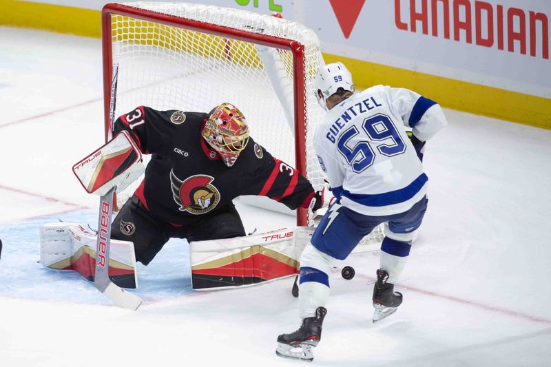 Oct 19, 2024; Ottawa, Ontario, CAN; Ottawa Senators goalie Anton Forsberg (31) makes a save in front of Tampa Bay Lightning center Jake Guentzel (59) in the third period at the Canadian Tire Centre. Mandatory Credit: Marc DesRosiers-Imagn Images