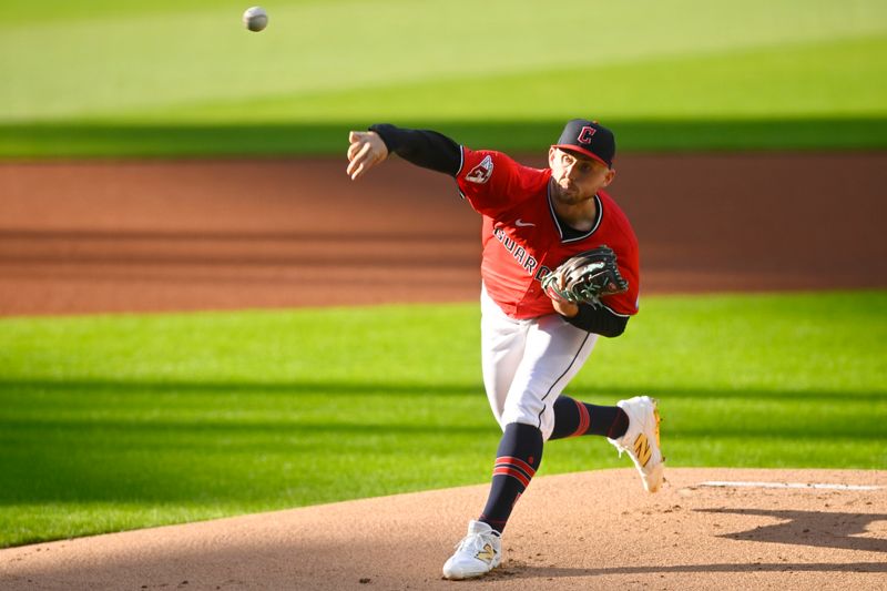 Apr 22, 2025; Cleveland, Ohio, USA; Cleveland Guardians starting pitcher Tanner Bibee (28) delivers a pitch in the first inning against the New York Yankees at Progressive Field. Mandatory Credit: David Richard-Imagn Images