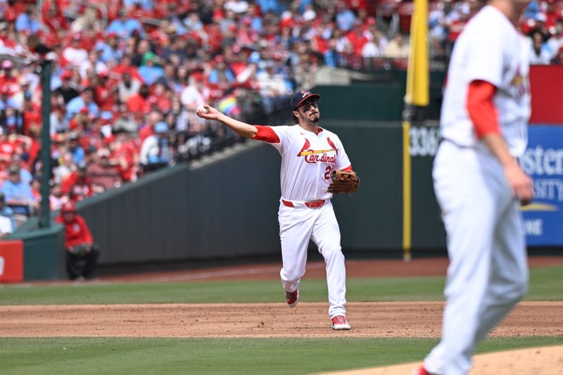 Apr 7, 2024; St. Louis, Missouri, USA; St. Louis Cardinals third baseman Nolan Arenado (28) throws to first base during the second inning against the Miami Marlins at Busch Stadium. Mandatory Credit: Jeff Le-USA TODAY Sports