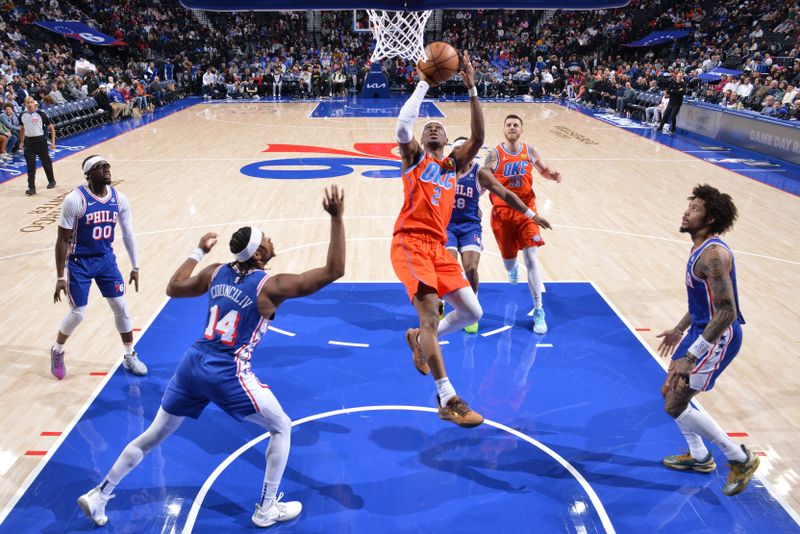 PHILADELPHIA, PA - JANUARY 14: Shai Gilgeous-Alexander #2 of the Oklahoma City Thunder drives to the basket during the game against the Philadelphia 76ers on January 14, 2025 at the Wells Fargo Center in Philadelphia, Pennsylvania NOTE TO USER: User expressly acknowledges and agrees that, by downloading and/or using this Photograph, user is consenting to the terms and conditions of the Getty Images License Agreement. Mandatory Copyright Notice: Copyright 2025 NBAE (Photo by Jesse D. Garrabrant/NBAE via Getty Images)