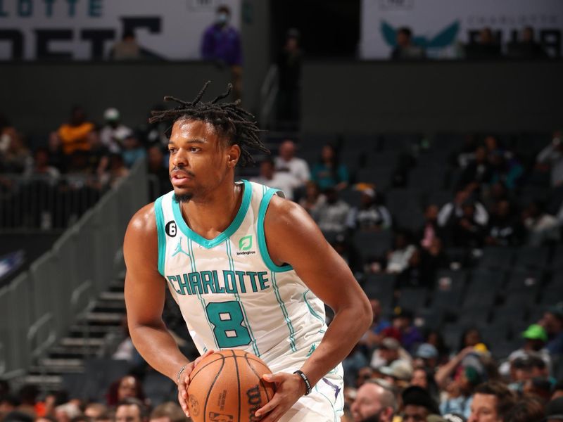 CHARLOTTE, NC - JANUARY 4: Dennis Smith Jr. #8 of the Charlotte Hornets handles the ball during the game against the Memphis Grizzlies on January 4, 2023 at Spectrum Center in Charlotte, North Carolina. NOTE TO USER: User expressly acknowledges and agrees that, by downloading and or using this photograph, User is consenting to the terms and conditions of the Getty Images License Agreement. Mandatory Copyright Notice: Copyright 2023 NBAE (Photo by Kent Smith/NBAE via Getty Images)