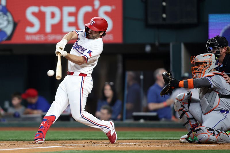 Jun 18, 2024; Arlington, Texas, USA; Texas Rangers third base Josh Smith (8) hits a single in the first inning against the New York Mets at Globe Life Field. Mandatory Credit: Tim Heitman-USA TODAY Sports