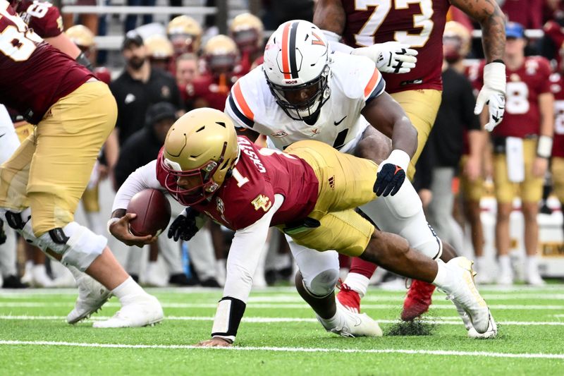 Sep 30, 2023; Chestnut Hill, Massachusetts, USA; Boston College Eagles quarterback Thomas Castellanos (1) drives with the ball against the Virginia Cavaliers during the second half at Alumni Stadium. Mandatory Credit: Brian Fluharty-USA TODAY Sports