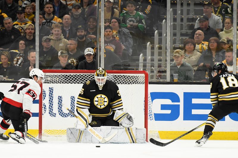 Apr 16, 2024; Boston, Massachusetts, USA;  Ottawa Senators center Shane Pinto (57) looks for a rebound in front of Boston Bruins goaltender Linus Ullmark (35) during the first period at TD Garden. Mandatory Credit: Bob DeChiara-USA TODAY Sports