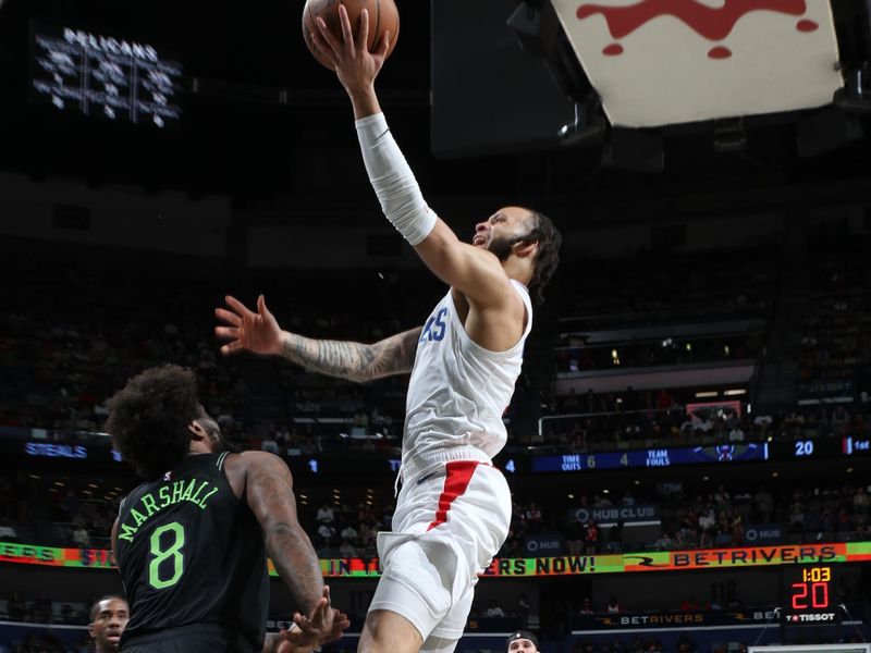 NEW ORLEANS, LA - MARCH 15: Amir Coffey #7 of the LA Clippers drives to the basket during the game against the New Orleans Pelicans on March 15, 2024 at the Smoothie King Center in New Orleans, Louisiana. NOTE TO USER: User expressly acknowledges and agrees that, by downloading and or using this Photograph, user is consenting to the terms and conditions of the Getty Images License Agreement. Mandatory Copyright Notice: Copyright 2024 NBAE (Photo by Layne Murdoch Jr./NBAE via Getty Images)