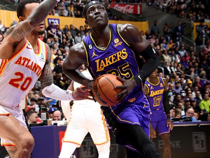 LOS ANGELES, CA - JANUARY 6: Wenyen Gabriel #35 of the Los Angeles Lakers drives to the basket during the game against the Atlanta Hawks on January 6, 2023 at Crypto.Com Arena in Los Angeles, California. NOTE TO USER: User expressly acknowledges and agrees that, by downloading and/or using this Photograph, user is consenting to the terms and conditions of the Getty Images License Agreement. Mandatory Copyright Notice: Copyright 2023 NBAE (Photo by Andrew D. Bernstein/NBAE via Getty Images)