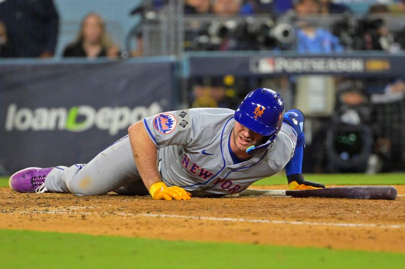 Oct 20, 2024; Los Angeles, California, USA; New York Mets first baseman Pete Alonso (20) reacts after fouling a ball off of his foot in the eighth inning against the Los Angeles Dodgers during game six of the NLCS for the 2024 MLB playoffs at Dodger Stadium. Mandatory Credit: Jayne Kamin-Oncea-Imagn Images