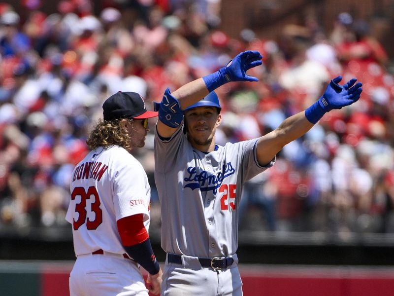 Jun 8, 2025; St. Louis, Missouri, USA;  Los Angeles Dodgers second baseman Tommy Edman (25) reacts after hitting a one run double against the St. Louis Cardinals during the fourth inning at Busch Stadium. Mandatory Credit: Jeff Curry-Imagn Images