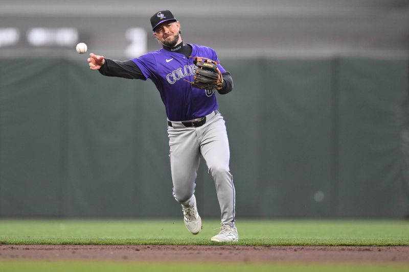 May 1, 2025; San Francisco, California, USA; Colorado Rockies second baseman Kyle Farmer (6) throws to first base for an out against the San Francisco Giants in the second inning at Oracle Park. Mandatory Credit: Eakin Howard-Imagn Images