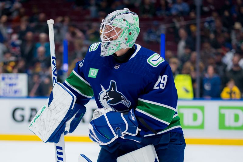 Mar 13, 2024; Vancouver, British Columbia, CAN; Vancouver Canucks goalie Casey DeSmith (29) smiles during warm up prior to a game against the Colorado Avalanche at Rogers Arena. Mandatory Credit: Bob Frid-USA TODAY Sports