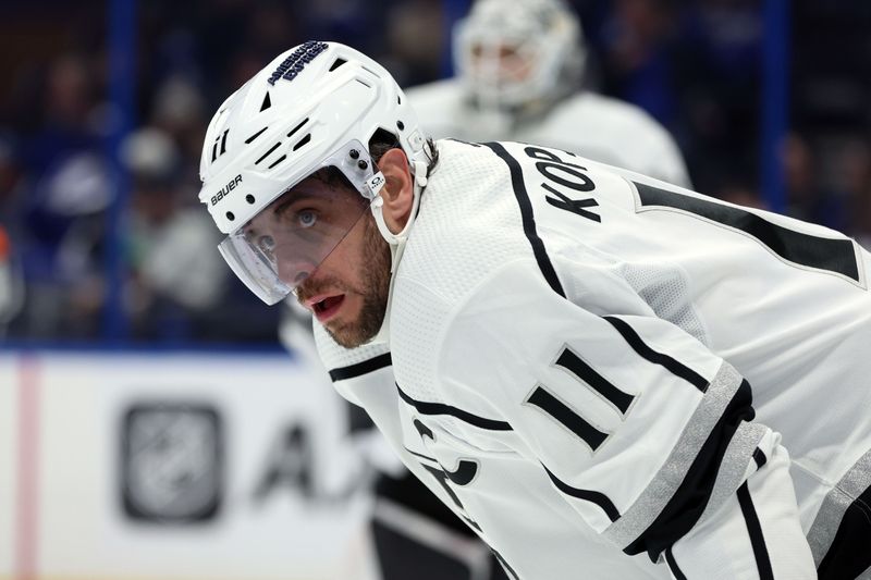 Jan 9, 2024; Tampa, Florida, USA; Los Angeles Kings center Anze Kopitar (11) looks on against the Tampa Bay Lightning during the third period at Amalie Arena. Mandatory Credit: Kim Klement Neitzel-USA TODAY Sports