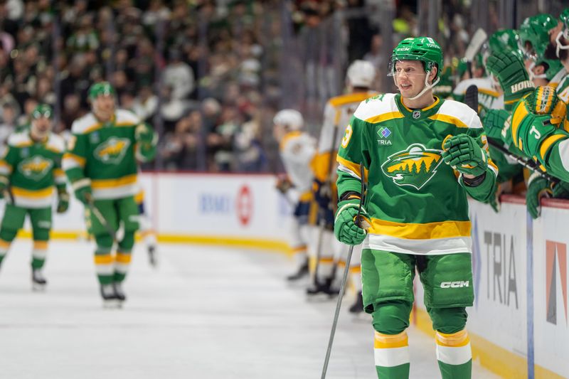 Dec 31, 2024; Saint Paul, Minnesota, USA; Minnesota Wild center Marco Rossi (23) skates to the bench after scoring against the Nashville Predators in the first period at Xcel Energy Center. Mandatory Credit: Matt Blewett-Imagn Images