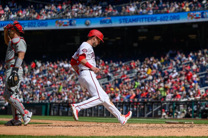 Apr 7, 2024; Washington, District of Columbia, USA; Washington Nationals outfielder Lane Thomas (28) scores a run during the fifth inning against the Philadelphia Phillies at Nationals Park. Mandatory Credit: Reggie Hildred-USA TODAY Sports