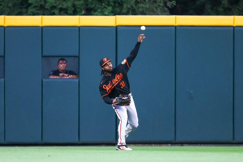 May 6, 2023; Atlanta, Georgia, USA; Baltimore Orioles center fielder Cedric Mullins (31) throws the ball in from the outfield against the Atlanta Braves in the fourth inning at Truist Park. Mandatory Credit: Brett Davis-USA TODAY Sports