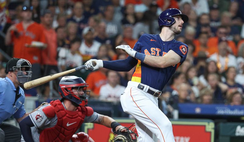 Aug 1, 2023; Houston, Texas, USA; Houston Astros right fielder Kyle Tucker (30) drives in two runs with an RBI single during the third inning against the Cleveland Guardians at Minute Maid Park. Mandatory Credit: Troy Taormina-USA TODAY Sports