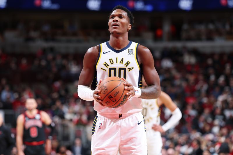 CHICAGO, IL - DECEMBER 6: Bennedict Mathurin #00 of the Indiana Pacers shoots a free throw during the game against the Chicago Bulls on December 6, 2024 at United Center in Chicago, Illinois. NOTE TO USER: User expressly acknowledges and agrees that, by downloading and or using this photograph, User is consenting to the terms and conditions of the Getty Images License Agreement. Mandatory Copyright Notice: Copyright 2024 NBAE (Photo by Jeff Haynes/NBAE via Getty Images)