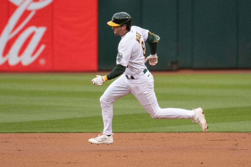 Jun 27, 2023; Oakland, California, USA; Oakland Athletics left fielder Tyler Wade (8) runs to third base after hitting a triple during the third inning against the New York Yankees at Oakland-Alameda County Coliseum. Mandatory Credit: Ed Szczepanski-USA TODAY Sports