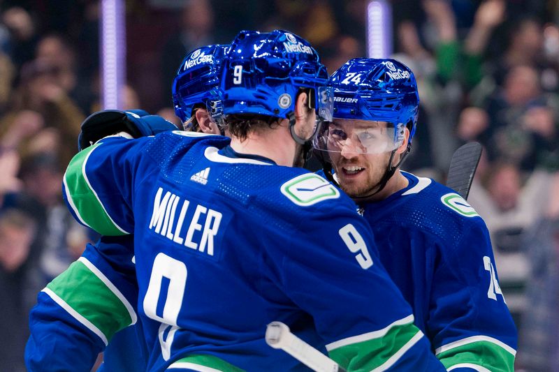 Jan 24, 2024; Vancouver, British Columbia, CAN; Vancouver Canucks forward Brock Boeser (6) and forward J.T. Miller (9) and forward Pius Suter (24) celebrate Suter   s second goal of the game against the St. Louis Blues in the third period at Rogers Arena. Blues 4-3 in overtime. Mandatory Credit: Bob Frid-USA TODAY Sports