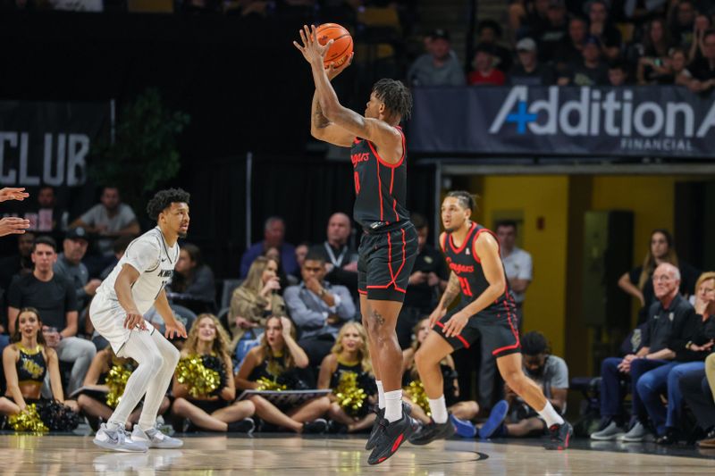 Jan 25, 2023; Orlando, Florida, USA; Houston Cougars guard Marcus Sasser (0) shoots the ball during the second half against the UCF Knights at Addition Financial Arena. Mandatory Credit: Mike Watters-USA TODAY Sports