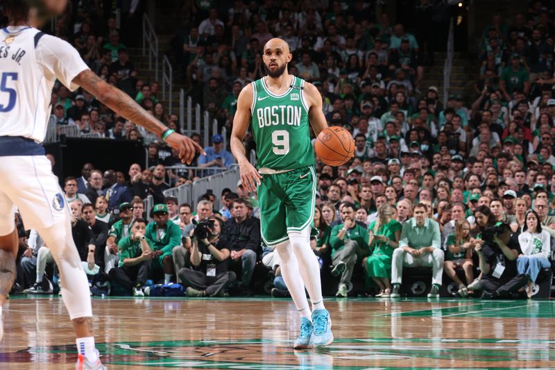 BOSTON, MA - JUNE 17: Derrick White #9 of the Boston Celtics dribbles the ball during the game against the Dallas Mavericks during Game 5 of the 2024 NBA Finals on June 17, 2024 at the TD Garden in Boston, Massachusetts. NOTE TO USER: User expressly acknowledges and agrees that, by downloading and or using this photograph, User is consenting to the terms and conditions of the Getty Images License Agreement. Mandatory Copyright Notice: Copyright 2024 NBAE  (Photo by Nathaniel S. Butler/NBAE via Getty Images)