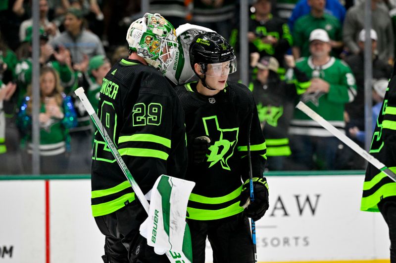 Apr 3, 2024; Dallas, Texas, USA; Dallas Stars goaltender Jake Oettinger (29) and defenseman Nils Lundkvist (5) celebrate on the ice after the Stars defeat the Edmonton Oilers at the American Airlines Center. Mandatory Credit: Jerome Miron-USA TODAY Sports