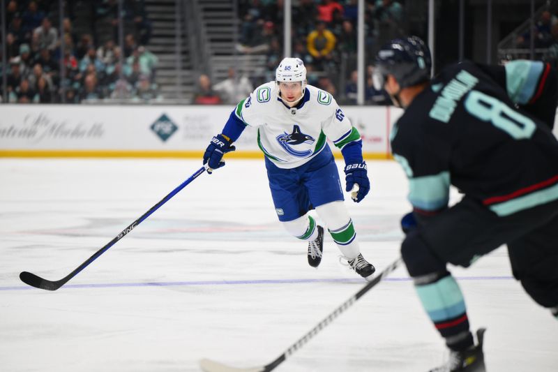 Nov 24, 2023; Seattle, Washington, USA; Vancouver Canucks right wing Ilya Mikheyev (65) during the third period against the Seattle Kraken at Climate Pledge Arena. Mandatory Credit: Steven Bisig-USA TODAY Sports