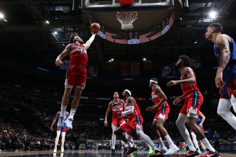 WASHINGTON, DC -? JANUARY 21:  Corey Kispert #24 of the Washington Wizards grabs the rebound during the game on January 21, 2024 at Capital One Arena in Washington, DC. NOTE TO USER: User expressly acknowledges and agrees that, by downloading and or using this Photograph, user is consenting to the terms and conditions of the Getty Images License Agreement. Mandatory Copyright Notice: Copyright 2024 NBAE (Photo by Stephen Gosling/NBAE via Getty Images)