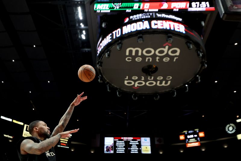 PORTLAND, OREGON - JANUARY 31: Damian Lillard #0 of the Milwaukee Bucks warms up before his return against the Portland Trail Blazers at Moda Center on January 31, 2024 in Portland, Oregon. (Photo by Steph Chambers/Getty Images)