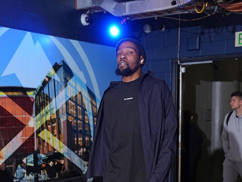 DENVER, CO - MARCH 5: Kevin Durant #35 of the Phoenix Suns arrives to the arena before the game against the Denver Nuggets on March 5, 2024 at the Ball Arena in Denver, Colorado. NOTE TO USER: User expressly acknowledges and agrees that, by downloading and/or using this Photograph, user is consenting to the terms and conditions of the Getty Images License Agreement. Mandatory Copyright Notice: Copyright 2024 NBAE (Photo by Garrett Ellwood/NBAE via Getty Images)