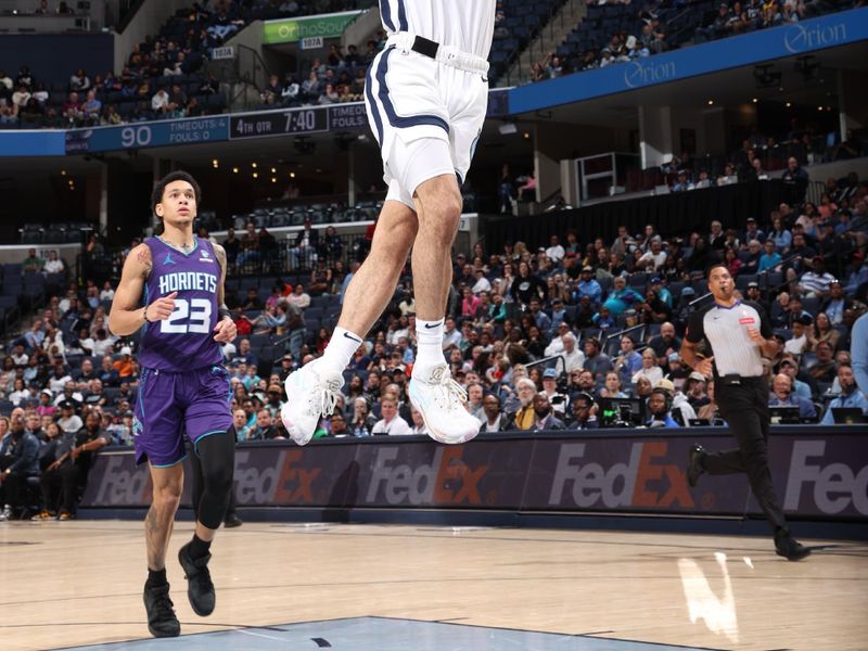 MEMPHIS, TN - MARCH 13: Scotty Pippen Jr. #1 of the Memphis Grizzlies dunks the ball during the game against the Charlotte Hornets on March 13, 2024 at FedExForum in Memphis, Tennessee. NOTE TO USER: User expressly acknowledges and agrees that, by downloading and or using this photograph, User is consenting to the terms and conditions of the Getty Images License Agreement. Mandatory Copyright Notice: Copyright 2024 NBAE (Photo by Joe Murphy/NBAE via Getty Images)