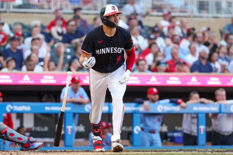 Aug 24, 2024; Minneapolis, Minnesota, USA; Minnesota Twins left fielder Trevor Larnach (9) hits a three-run home run against the St. Louis Cardinals during the third inning at Target Field. Mandatory Credit: Matt Krohn-USA TODAY Sports