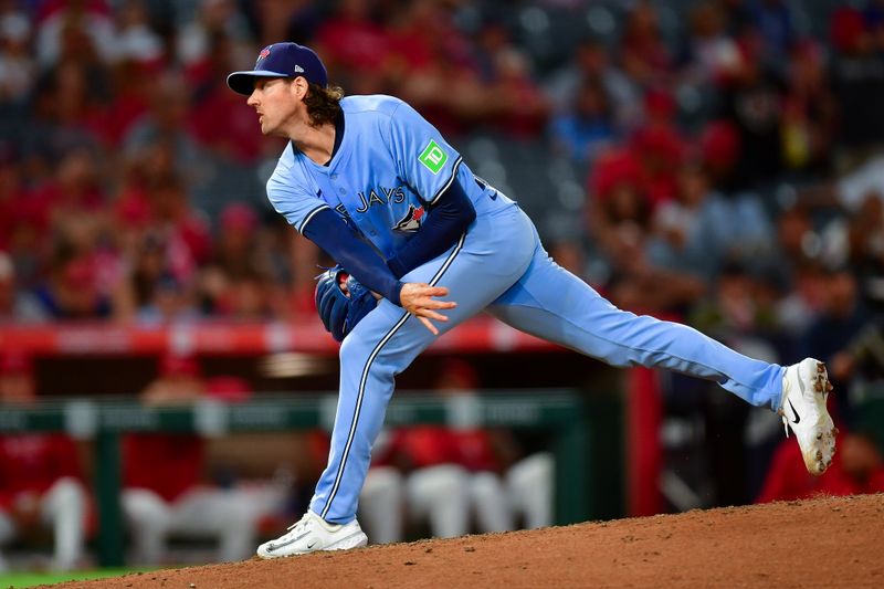 Aug 13, 2024; Anaheim, California, USA; Toronto Blue Jays pitcher Kevin Gausman (34) throws against the Los Angeles Angels during the fourth inning at Angel Stadium. Mandatory Credit: Gary A. Vasquez-USA TODAY Sports