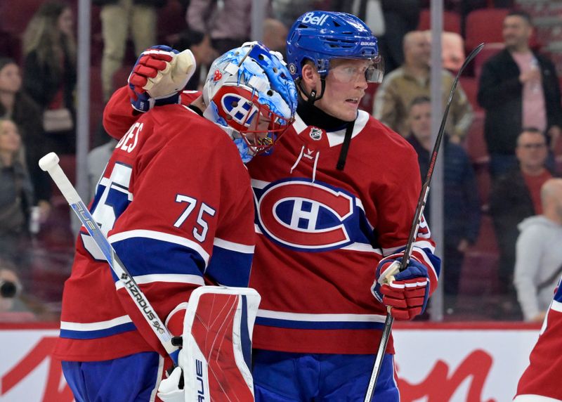 Sep 23, 2024; Montreal, Quebec, CAN; Montreal Canadiens goalie Jakub Dobes (75) and forward Patrik Laine (92) celebrate the win against the Philadelphia Flyers at the Bell Centre. Mandatory Credit: Eric Bolte-Imagn Images