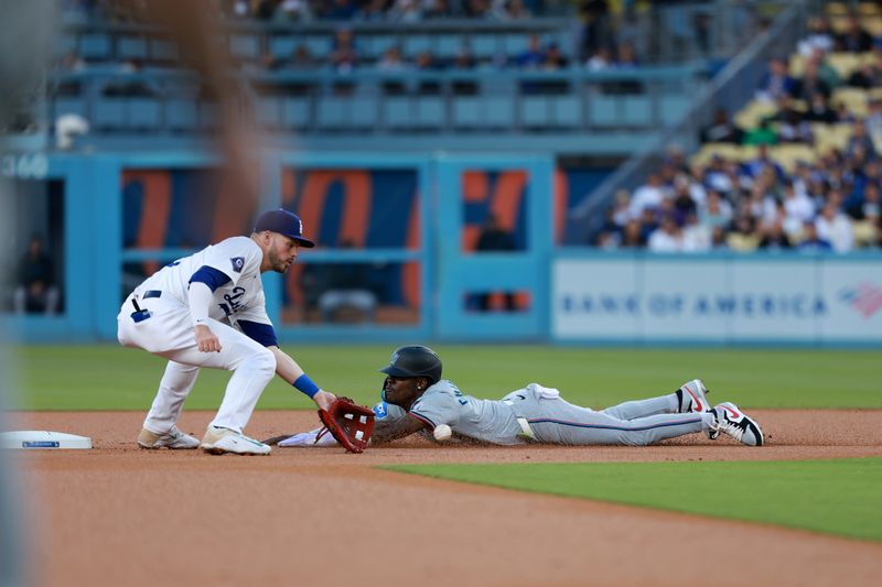 May 6, 2024; Los Angeles, California, USA;  Miami Marlins outfielder Jazz Chisholm Jr. (2) steals second base during the first inning against the Los Angeles Dodgers at Dodger Stadium. Mandatory Credit: Kiyoshi Mio-USA TODAY Sports